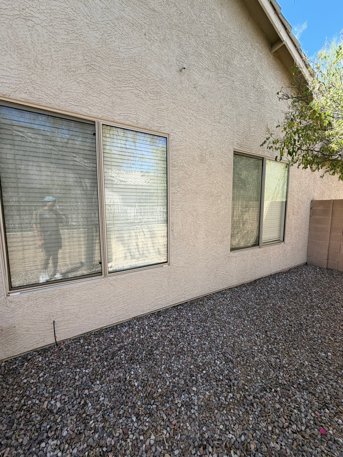 Fresh, tight window screens on a Phoenix home after re-meshing