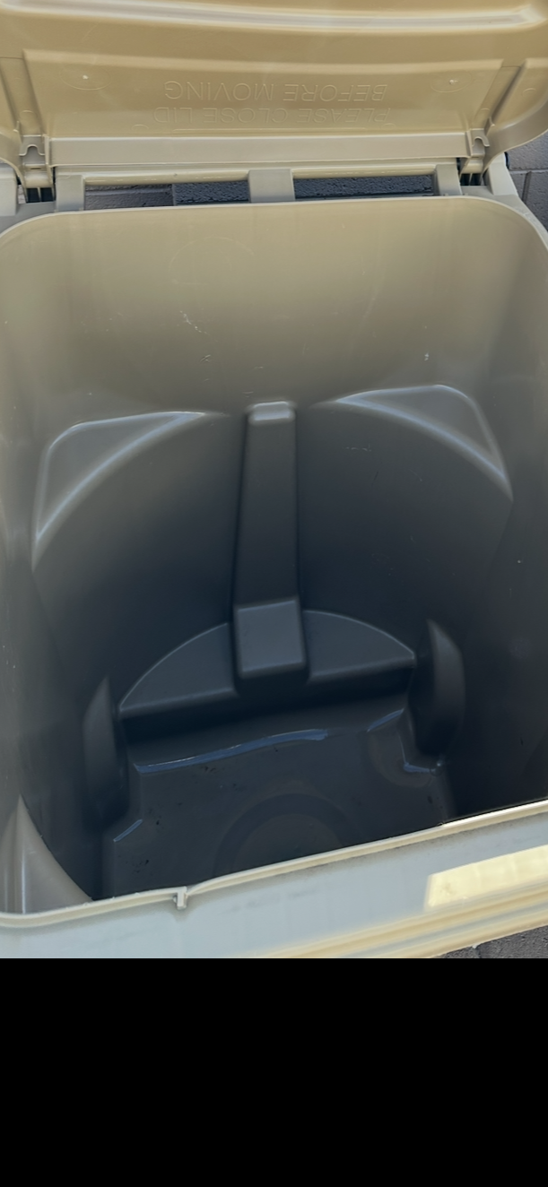 Clean garbage can showing interior results